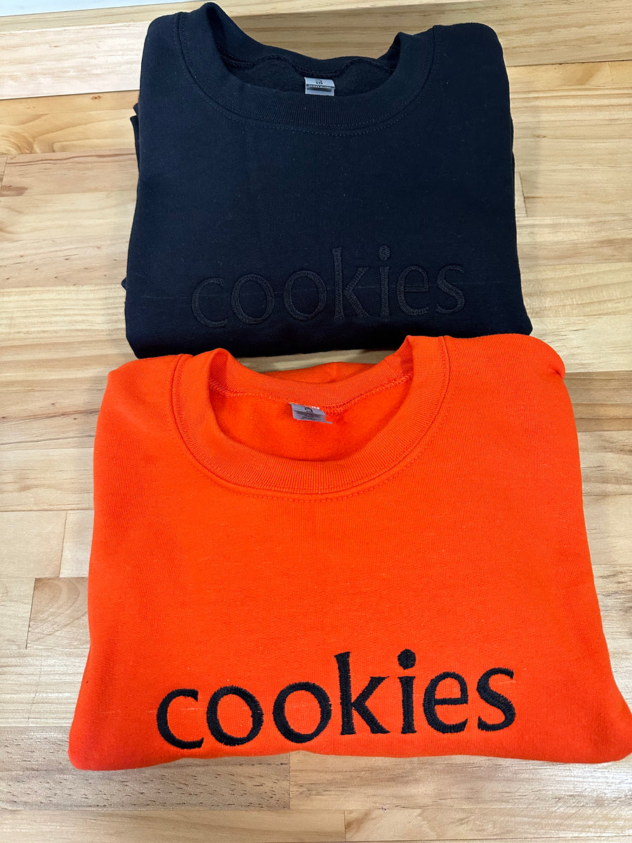 Embroidered "cookies" sweatshirt (orange or black) Bakery Tee Co