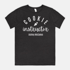 Open image in slideshow, Ashley McCakes Instructor Custom tee

