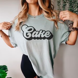 Open image in slideshow, Cursive Cake Tee (multiple colors)
