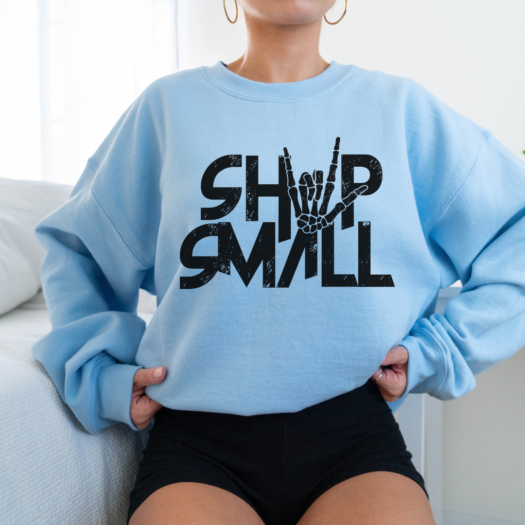 Shop Small Skelly Rock N Roll crew neck light blue